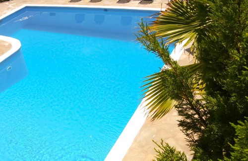 Agios Gordios Apartment | Studio with sea view, balcony, kitchenette, a/c, safe box