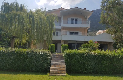 Skroponeria Apartment | The house is situated on the beach and it is only 1 minute walk .