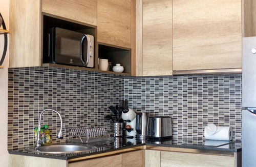 Rawai Apartment | Tropical Poo View 1 BR Apt Babylon M206
