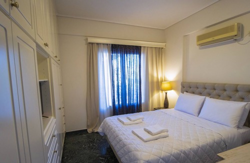 Nea Makri Villa | Villa 'Green Marble Livisi Pool Residence' with Mountain View, Wi-Fi and Air Conditioning