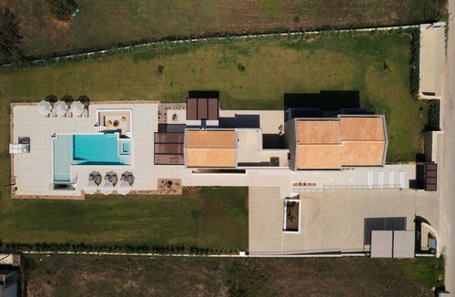 Almiros Beach Villa | Villa Hydria. Just a few meters from the sandy beach of Almyros.