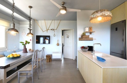 Amoudi Villa | Waterfront Villa Alexandros with Outdoor Jetted Tub