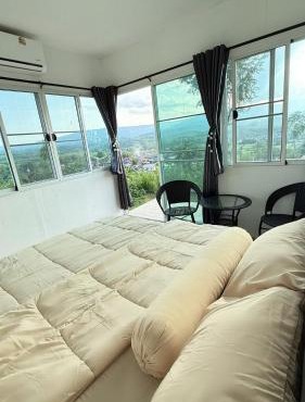 ภูโอบตะวันรีสอร์ต - Phu Oab Tawan Resort in Tha Wang Pha
