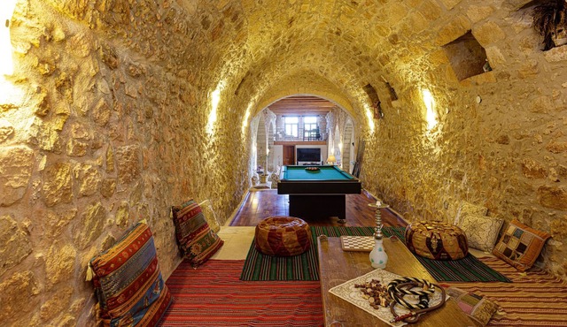 A unique historical manor offers high quality interior and panoramic sea views. in Rethymno