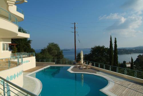 Liberty - Classic luxury sea view villa with private pool, Panoramic views to Kommeno & Corfu old Town in Kommeno