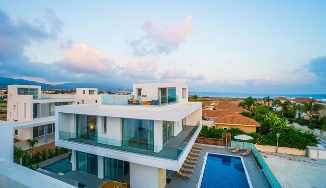 Modern Architecture & Cyprus Beauty: 5BR Villa with Sweeping Sea Views in Peyia