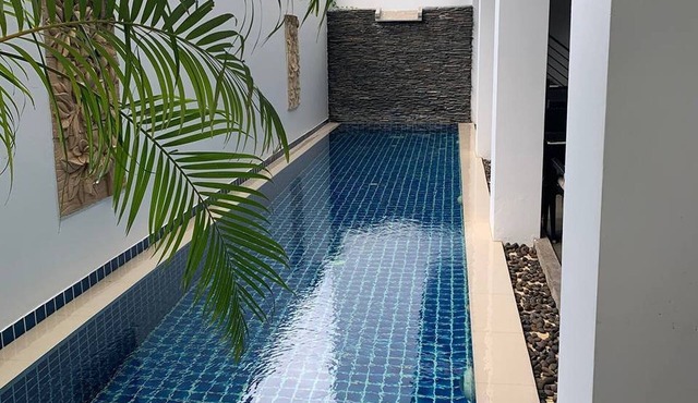 One World One Home Naiharn Hotel