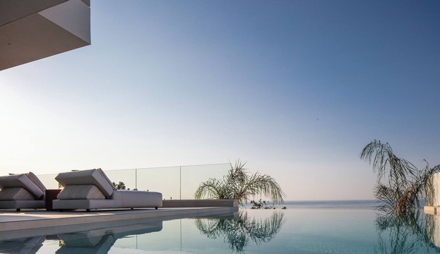 Stunning sea views, 450m from a sandy beach, heated pool, playroom and hot tub! in Rethymno