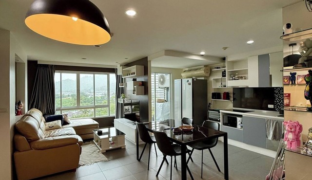 Tranquil 2-bedroom condo with AC and WiFi for a relaxing stay