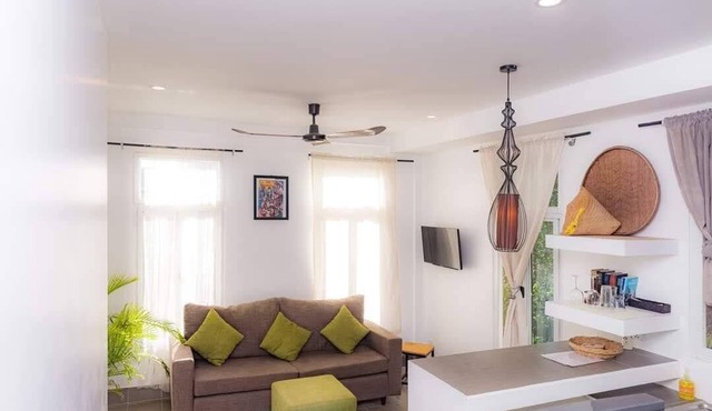 Tree-Shaded Bungalows Near Town with Kitchens & Scenic River Walks