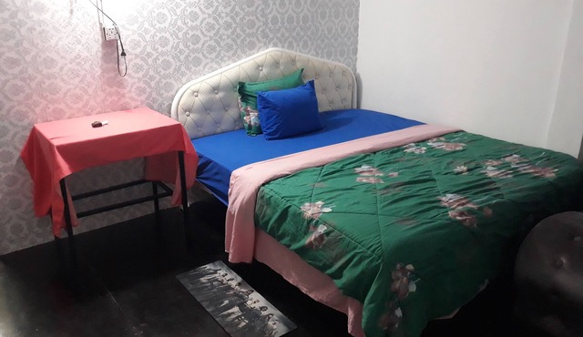 Vanny's King bed & Large Window in Phnom Penh.