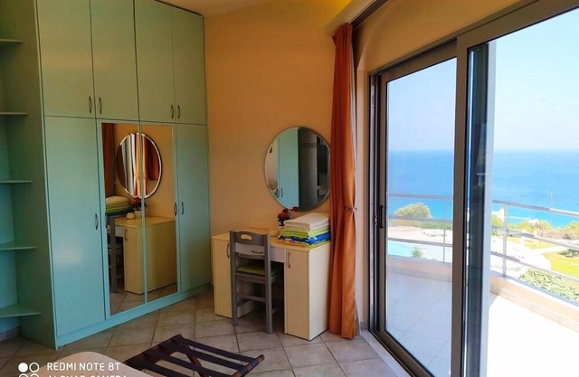 Kefalosbay Residence apartment floor & pool & panorama on Kefalos Bay