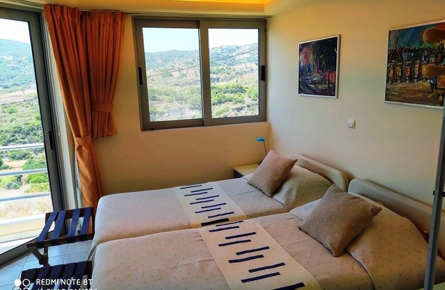 Kefalosbay Residence apartment floor & pool & panorama on Kefalos Bay