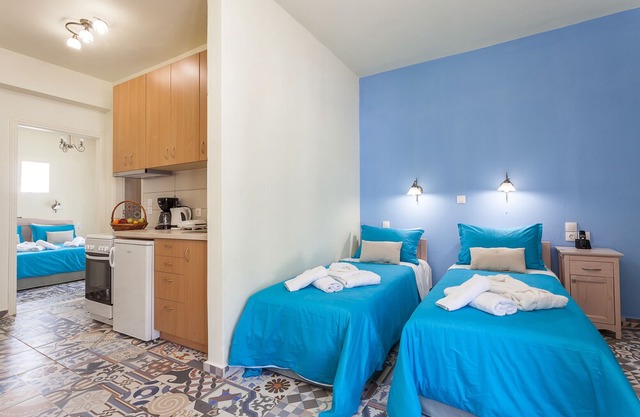 Suite with separate bedroom and mountain view