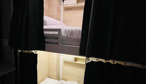 One Bed in 2 Shared Bunk Beds