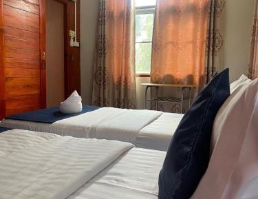Single Bed in Dormitory Room