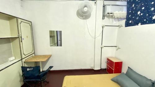 Single Bed in Dormitory Room
