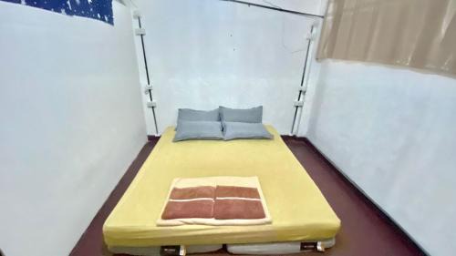 Single Bed in Dormitory Room