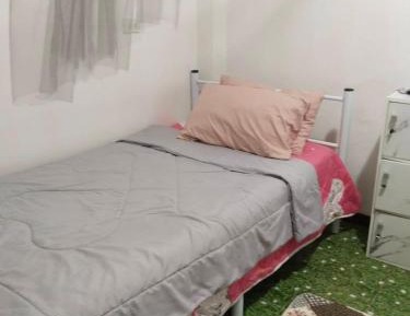 Single Bed in Female Dormitory Room