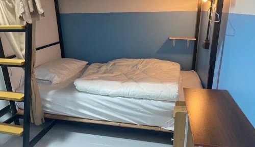 Single Bed in Dormitory Room