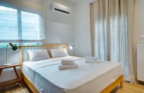 Papagou-Holargos Apartment | Garden Level Gem in the City