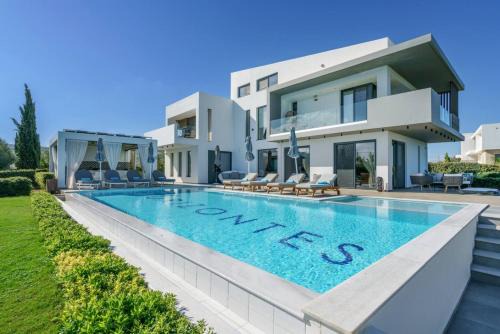 Luxury Villa Orizontes with Private Outdoor & Heated Indoor Pool, Hot Tub & Gym in Adelianos Kampos