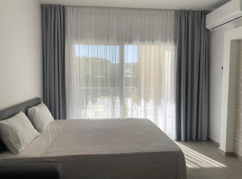 Family friendly modern flat in Caesar Resort &SPA, Long Beach İSKELE, KKTC in Trikomo